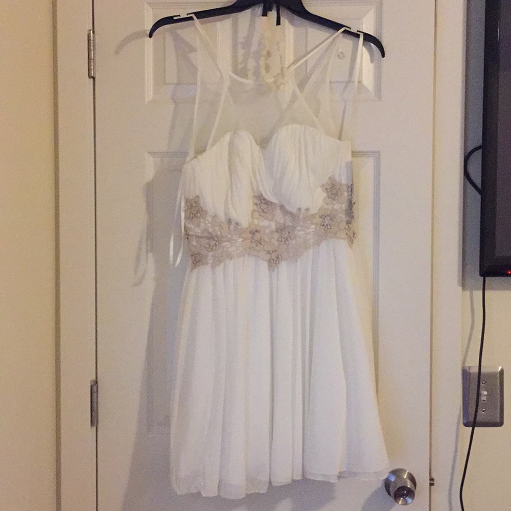 Beautiful cream colored dress brand new.